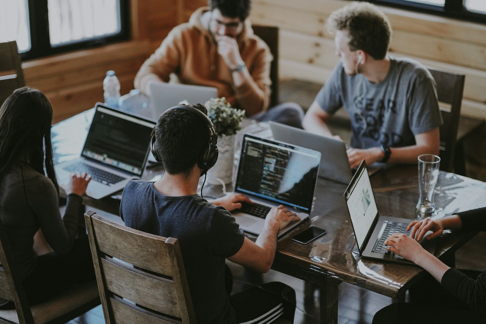 Software team working together around a shared table